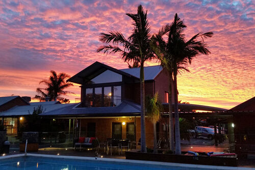 Board room and pool at sunset, Mclaren Vale Motel & Apartments